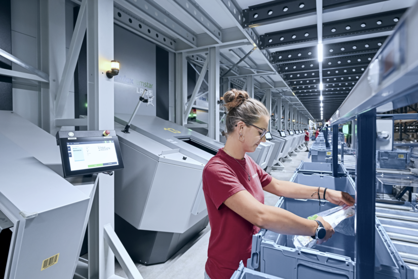 Warehouse worker loading a miniload